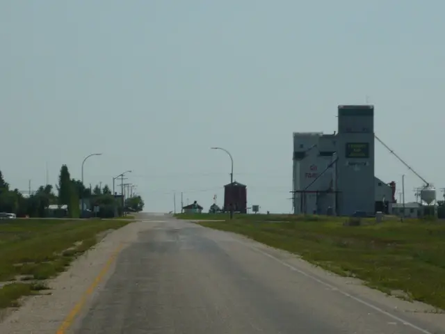 Grain elevators from the road into town